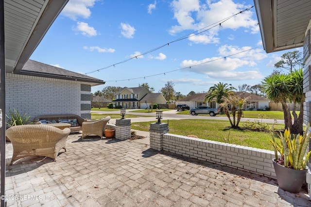 view of patio featuring a residential view