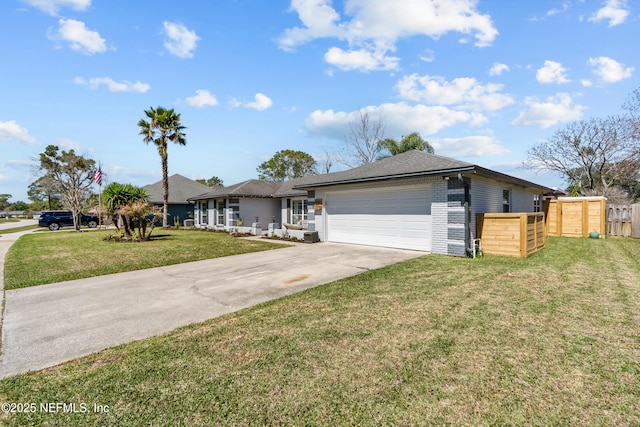 ranch-style house with a front yard, fence, driveway, a garage, and brick siding