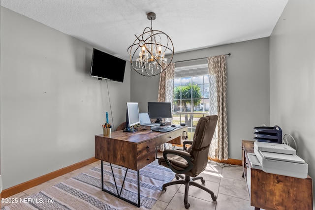 office featuring a notable chandelier, baseboards, a textured ceiling, and light tile patterned flooring