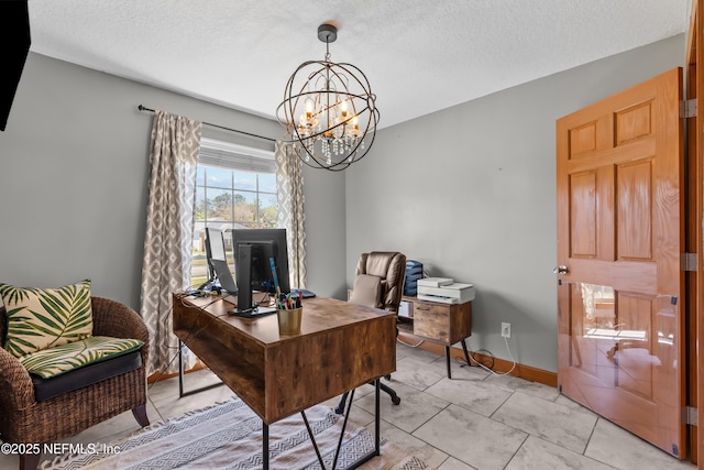 home office featuring a notable chandelier, baseboards, and a textured ceiling