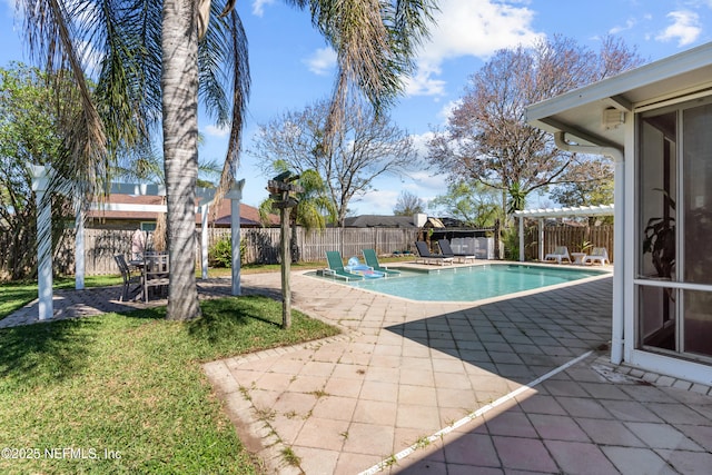 view of swimming pool with a fenced in pool, a patio, a fenced backyard, and a pergola