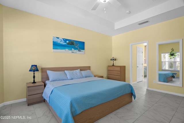 bedroom featuring visible vents, baseboards, and marble finish floor