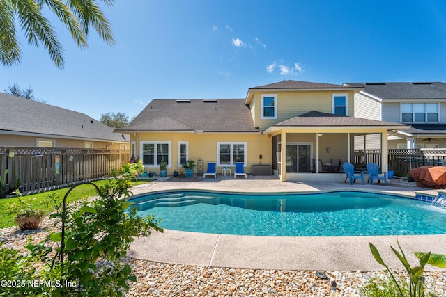 view of swimming pool featuring a patio area, a fenced in pool, and a fenced backyard