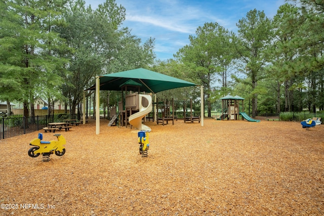 community play area featuring fence