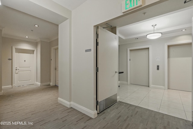 corridor featuring recessed lighting, baseboards, elevator, and ornamental molding