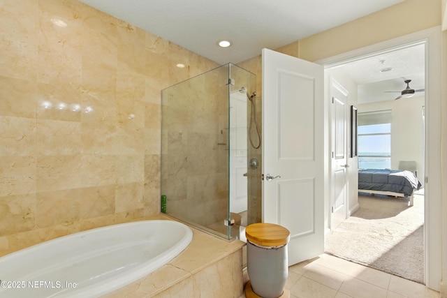 full bathroom featuring a garden tub, tile patterned floors, a tile shower, and ensuite bathroom