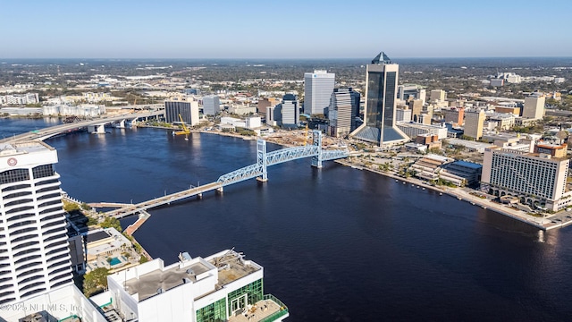 drone / aerial view with a view of city and a water view