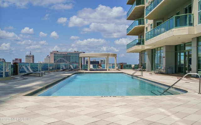 pool featuring a patio area