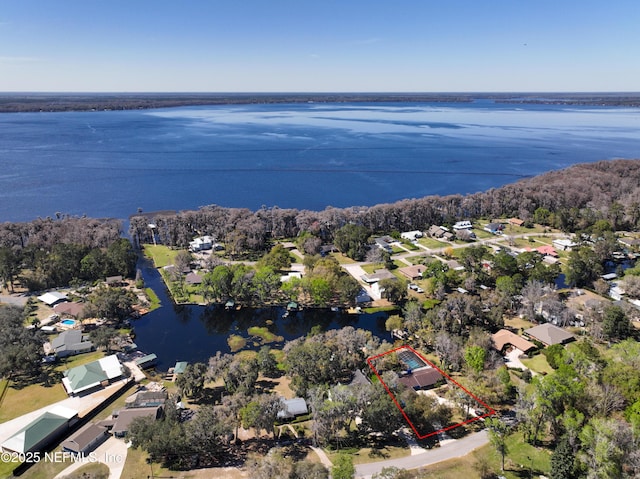 drone / aerial view with a water view