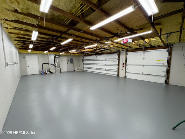 garage featuring a garage door opener