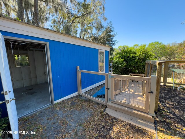 deck with an outdoor structure