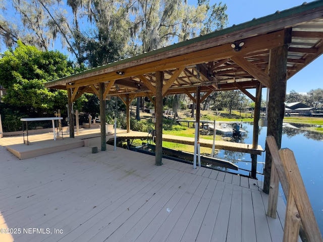 dock area with a water view