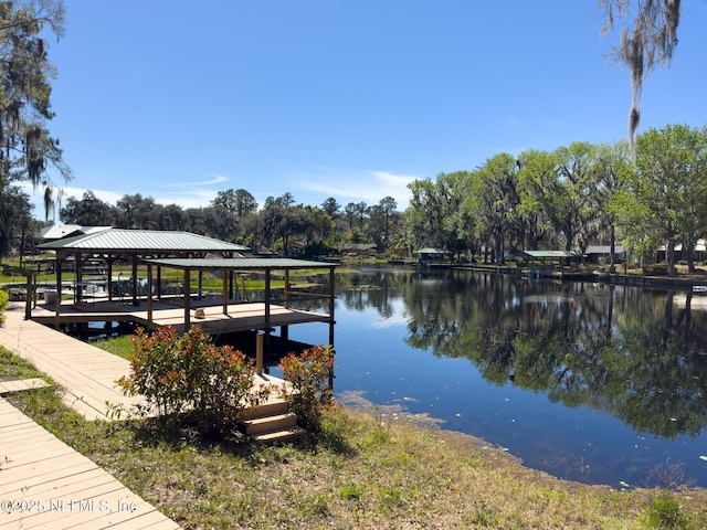 dock area featuring a water view