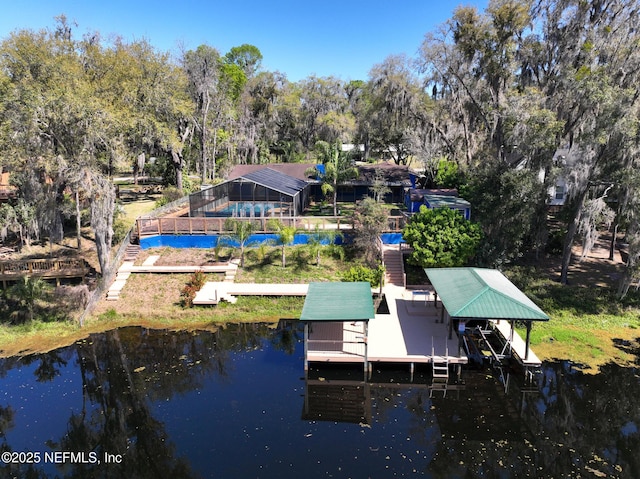 dock area with a water view and boat lift