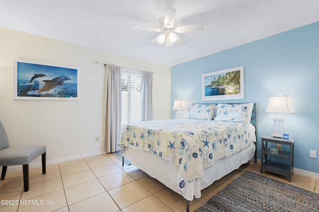 bedroom featuring tile patterned floors, a ceiling fan, and baseboards