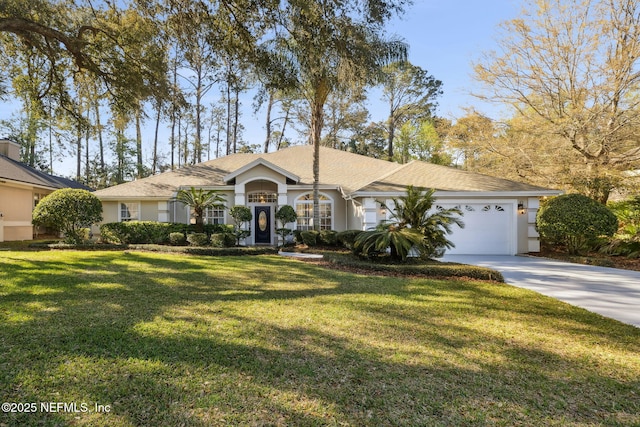 single story home with stucco siding, a front lawn, an attached garage, and driveway