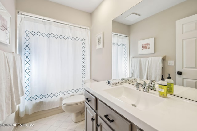 bathroom with tile patterned flooring, toilet, vanity, and shower / bath combo