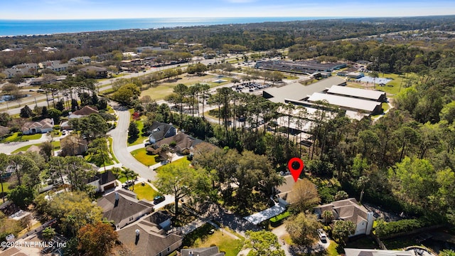 birds eye view of property featuring a residential view and a water view