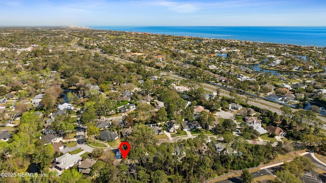 aerial view with a residential view and a water view