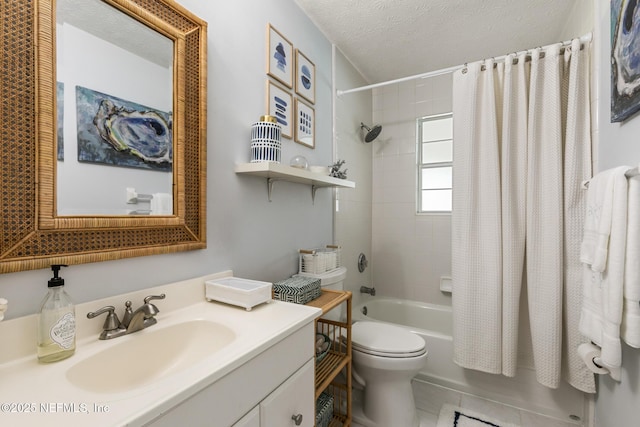 bathroom featuring shower / bathtub combination with curtain, a textured ceiling, vanity, and toilet