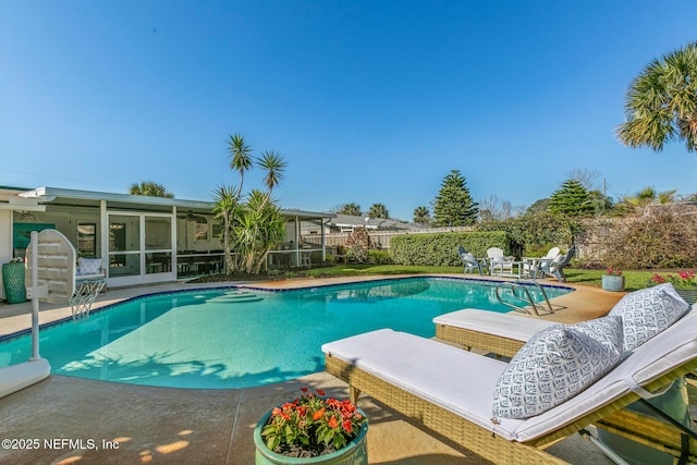 view of pool with a fenced in pool, a patio, and a fenced backyard