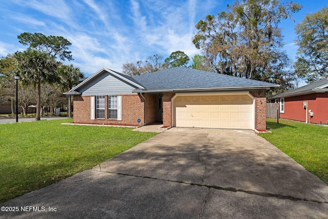 ranch-style home featuring brick siding, a garage, concrete driveway, and a front lawn