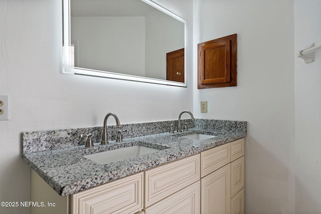 bathroom with double vanity and a sink