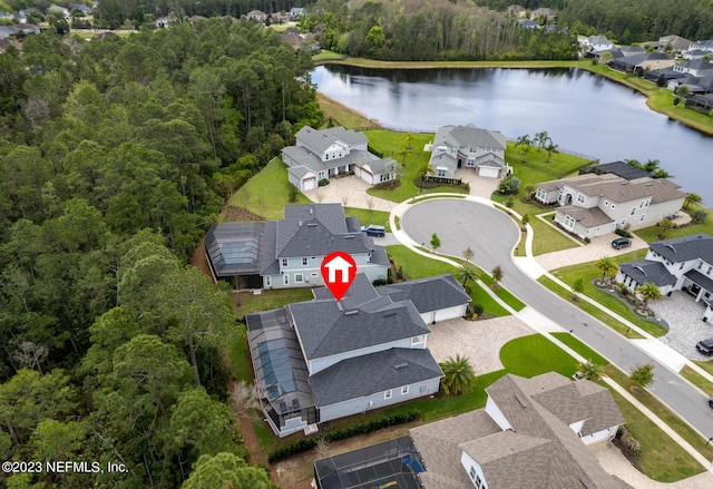 bird's eye view with a residential view and a water view