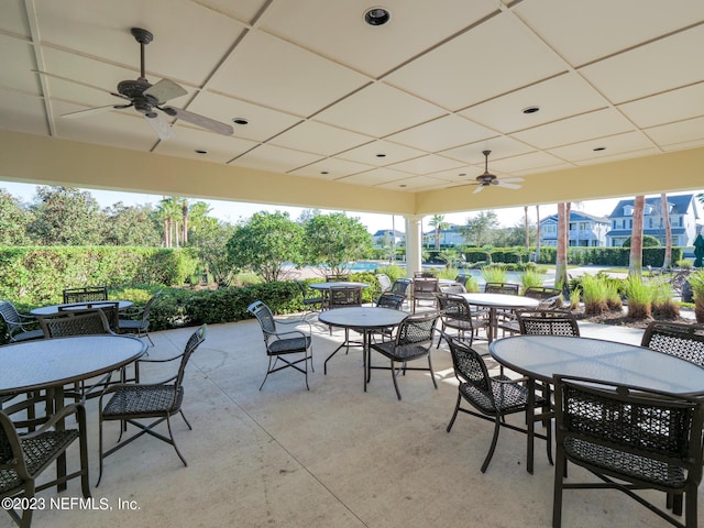 view of patio / terrace featuring outdoor dining area and ceiling fan