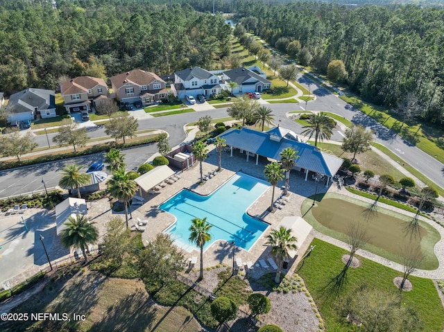 bird's eye view with a residential view and a forest view