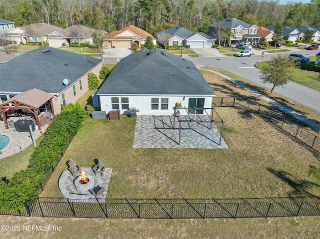 birds eye view of property with a residential view