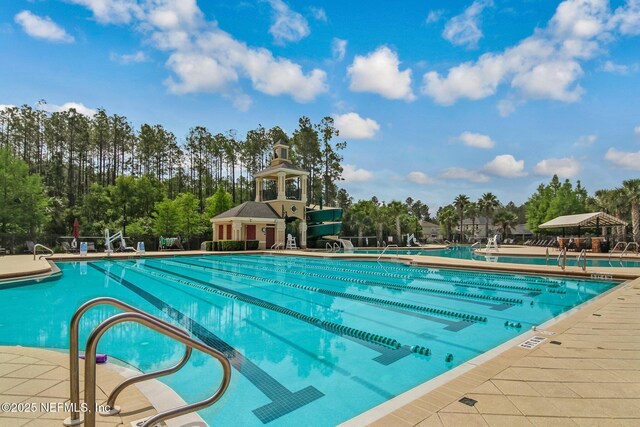 community pool featuring a patio area