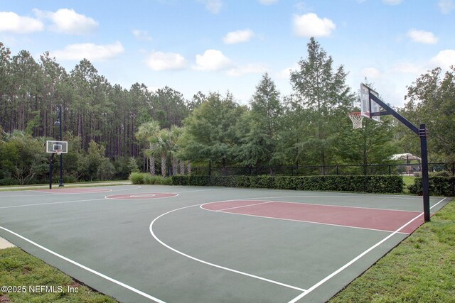 view of sport court with community basketball court and fence