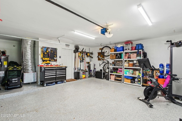 garage featuring a workshop area and a garage door opener