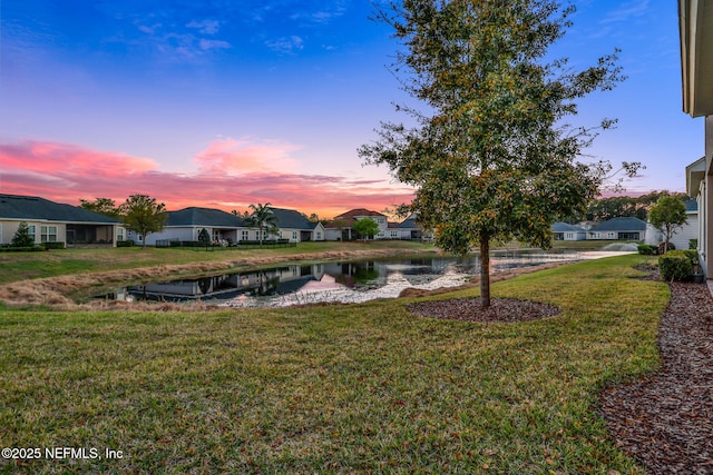 view of yard featuring a water view