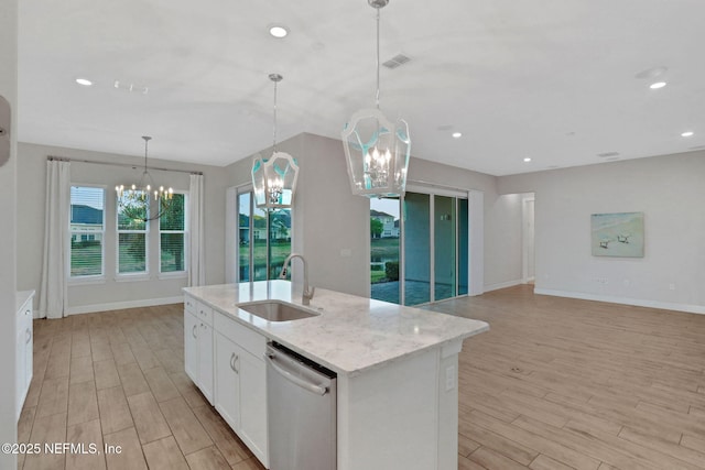 kitchen featuring a sink, light wood-style floors, an inviting chandelier, white cabinetry, and stainless steel dishwasher