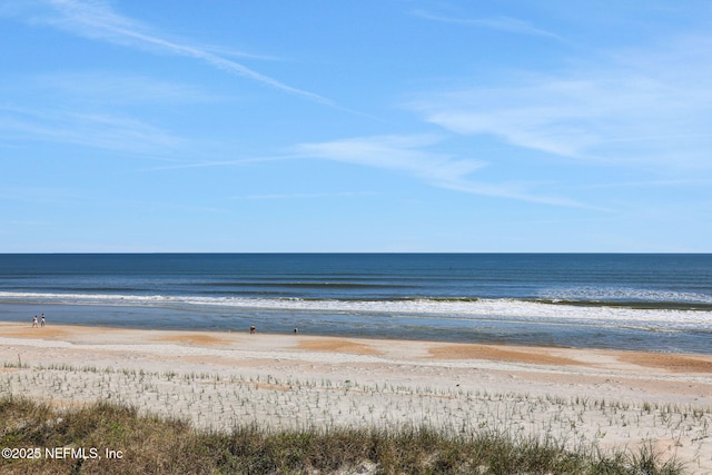 property view of water featuring a beach view