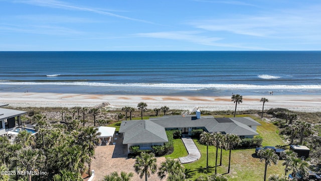 aerial view featuring a water view and a view of the beach