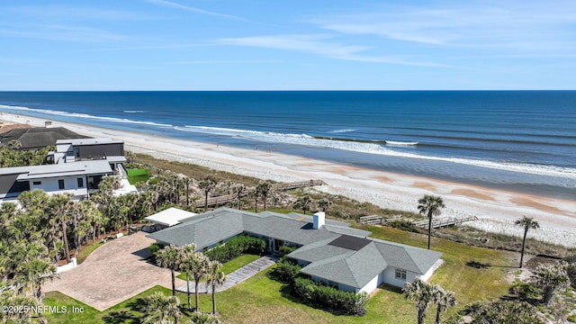 aerial view featuring a beach view and a water view