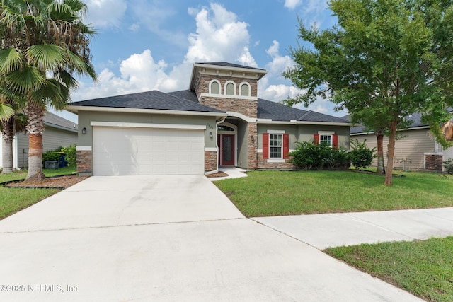 view of front of home featuring stucco siding, stone siding, concrete driveway, an attached garage, and a front yard