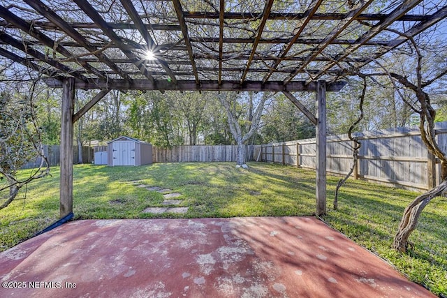 view of yard featuring an outbuilding, a storage shed, a pergola, and a patio area