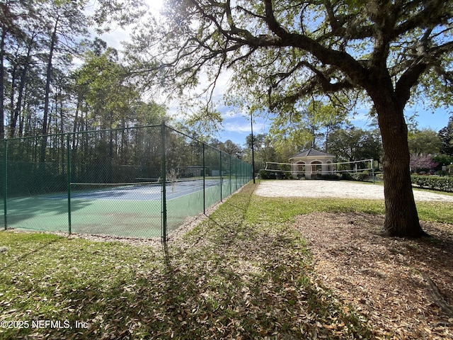 view of sport court with fence and volleyball court