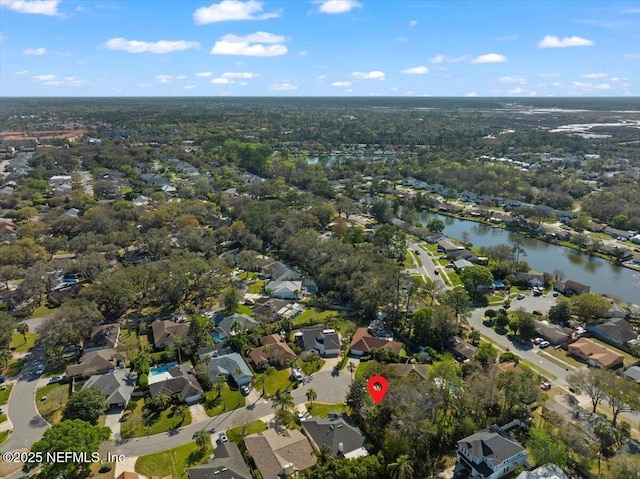 bird's eye view with a residential view and a water view