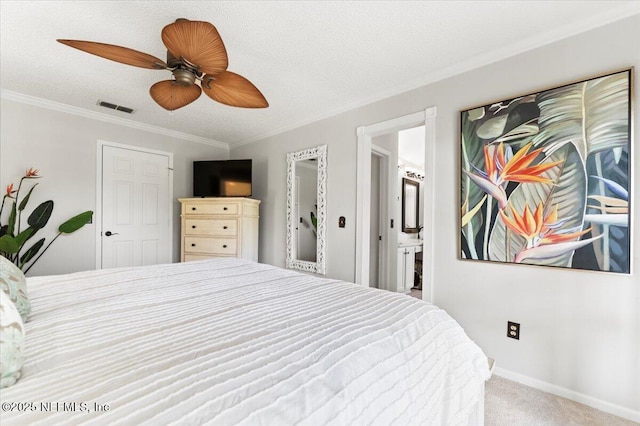 carpeted bedroom with visible vents, crown molding, ceiling fan, baseboards, and a textured ceiling