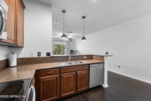 kitchen with visible vents, a peninsula, electric range, a sink, and stainless steel dishwasher