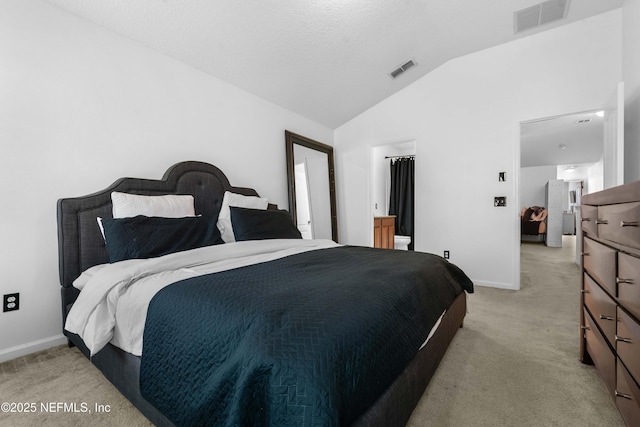 bedroom featuring lofted ceiling, baseboards, visible vents, and light carpet