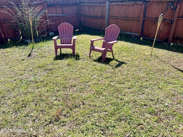 view of yard with fence