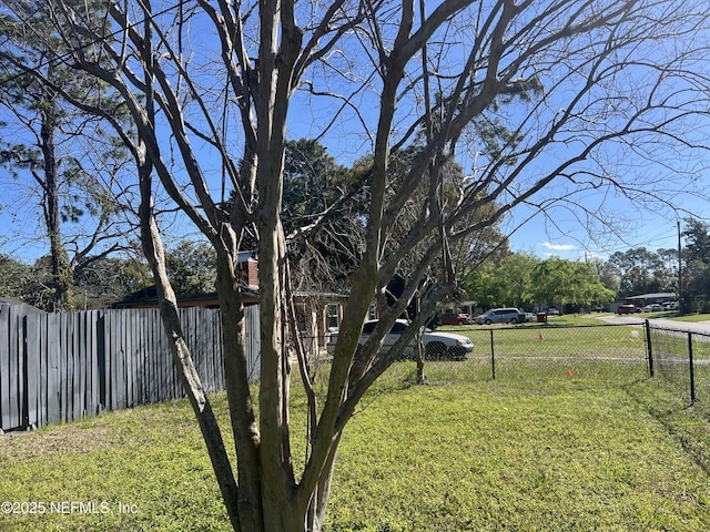 view of yard with fence