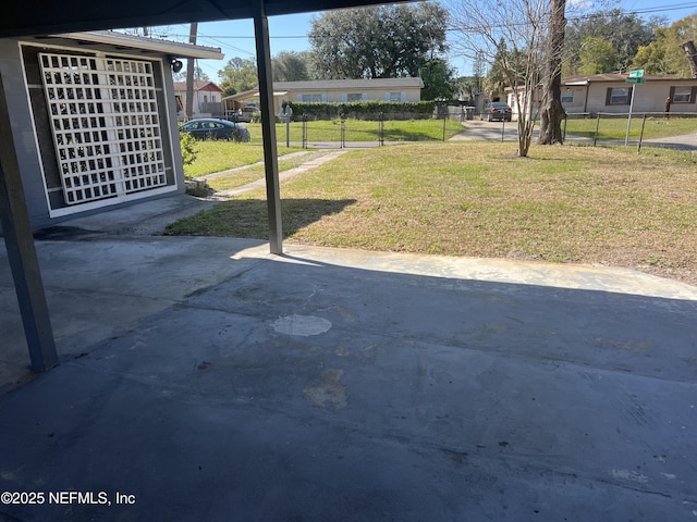 view of yard with a patio and fence