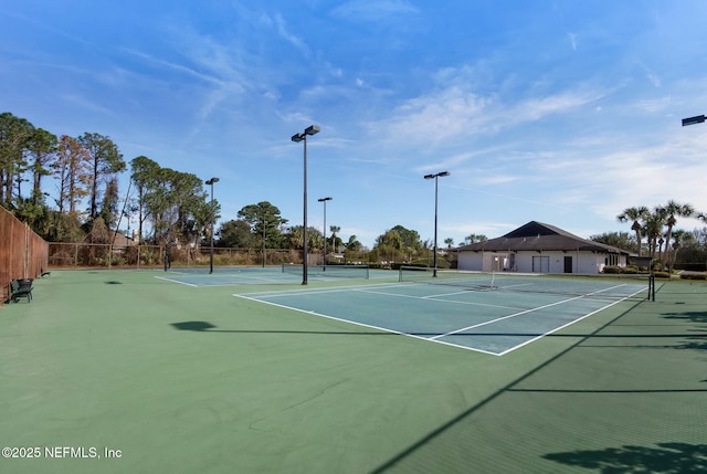 view of sport court with community basketball court and fence